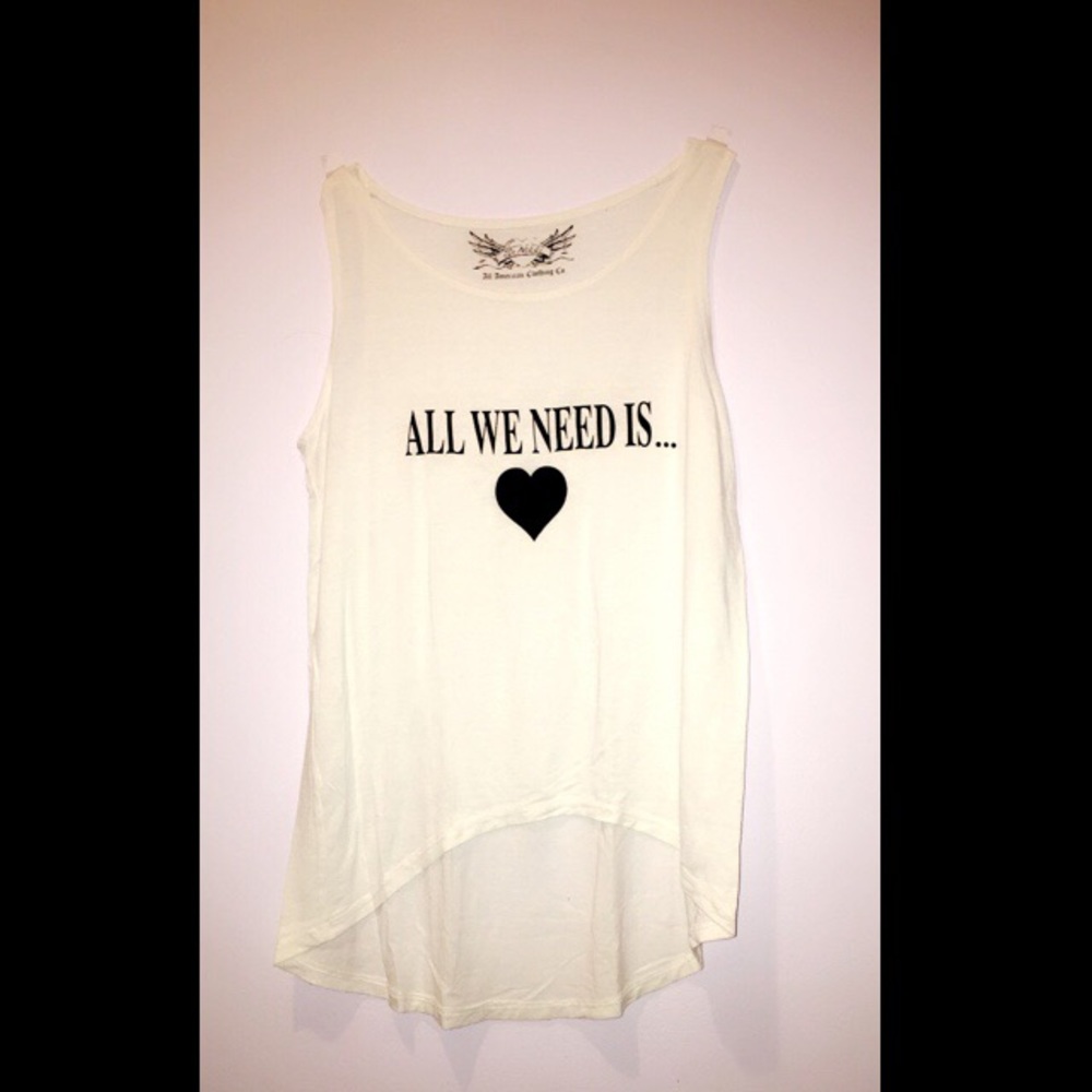 all we need is 🖤 high low tank top